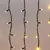 Гирлянда светодиодная "Айсикл" (бахрома) 4х0.6м 128LED тепл. бел. 8Вт 230В IP67 эффект мерцания провод каучук черн. Neon-Night 255-236, изображение 4